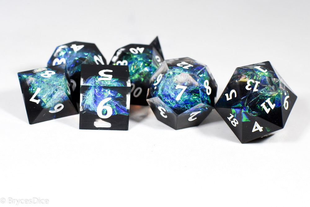 Deep Nether Sharp Edge Resin 7-Dice Dice (Blue-Green and Black w/ White Numbers)