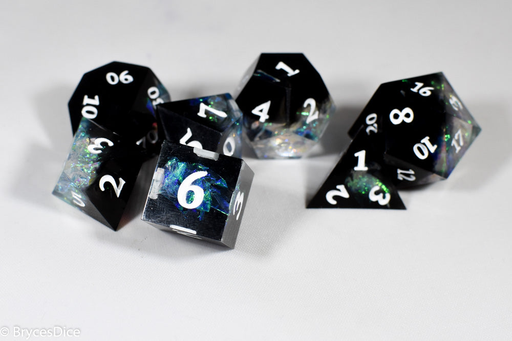 Deep Nether Sharp Edge Resin 7-Dice Dice (Blue-Green and Black w/ White Numbers)